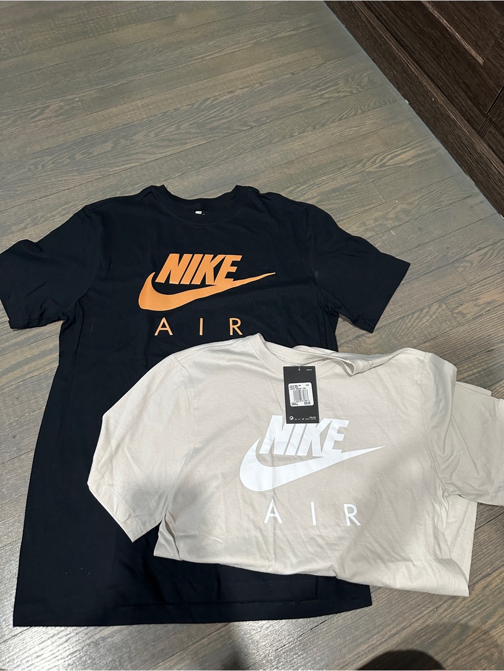 Nike Black T-Shirt with Orange Logo & Nike Cream/Beige T-Shirt with White Logo